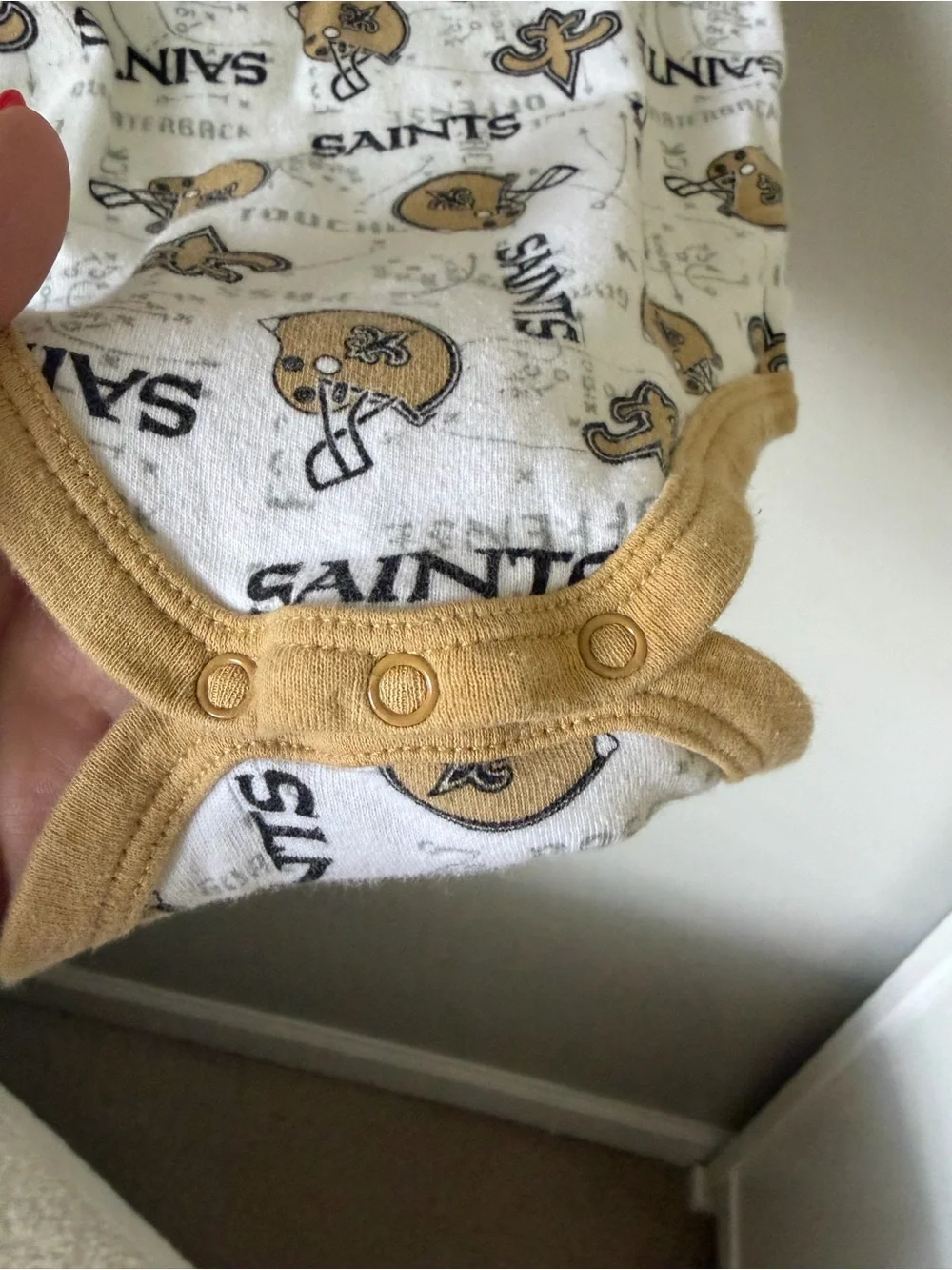 NFL New Orleans Saints Baby Bodysuit Short Sleeve Snap White Gold 0-3M